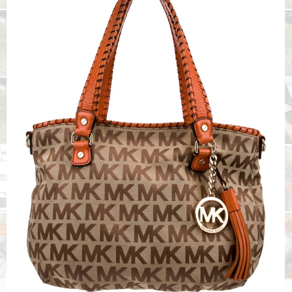 The Michael Kors Canvas Whipstitch-Trimmed Shoulder Bag